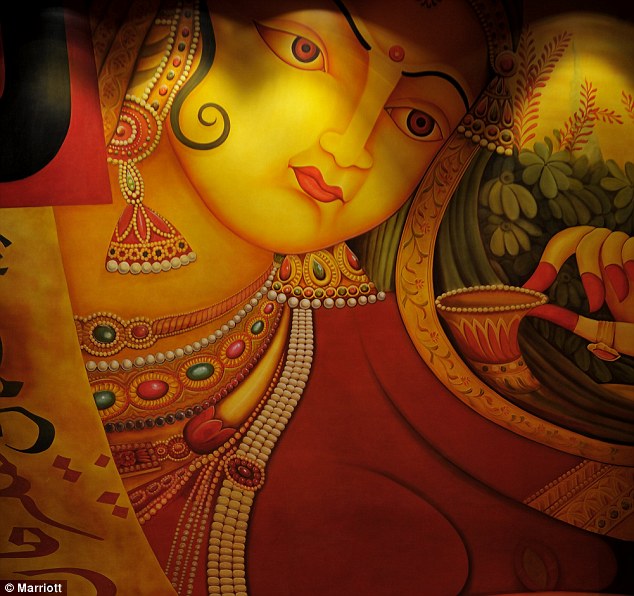 Brightening things up: A colourful mural on the wall of the Thai restaurant dining area 